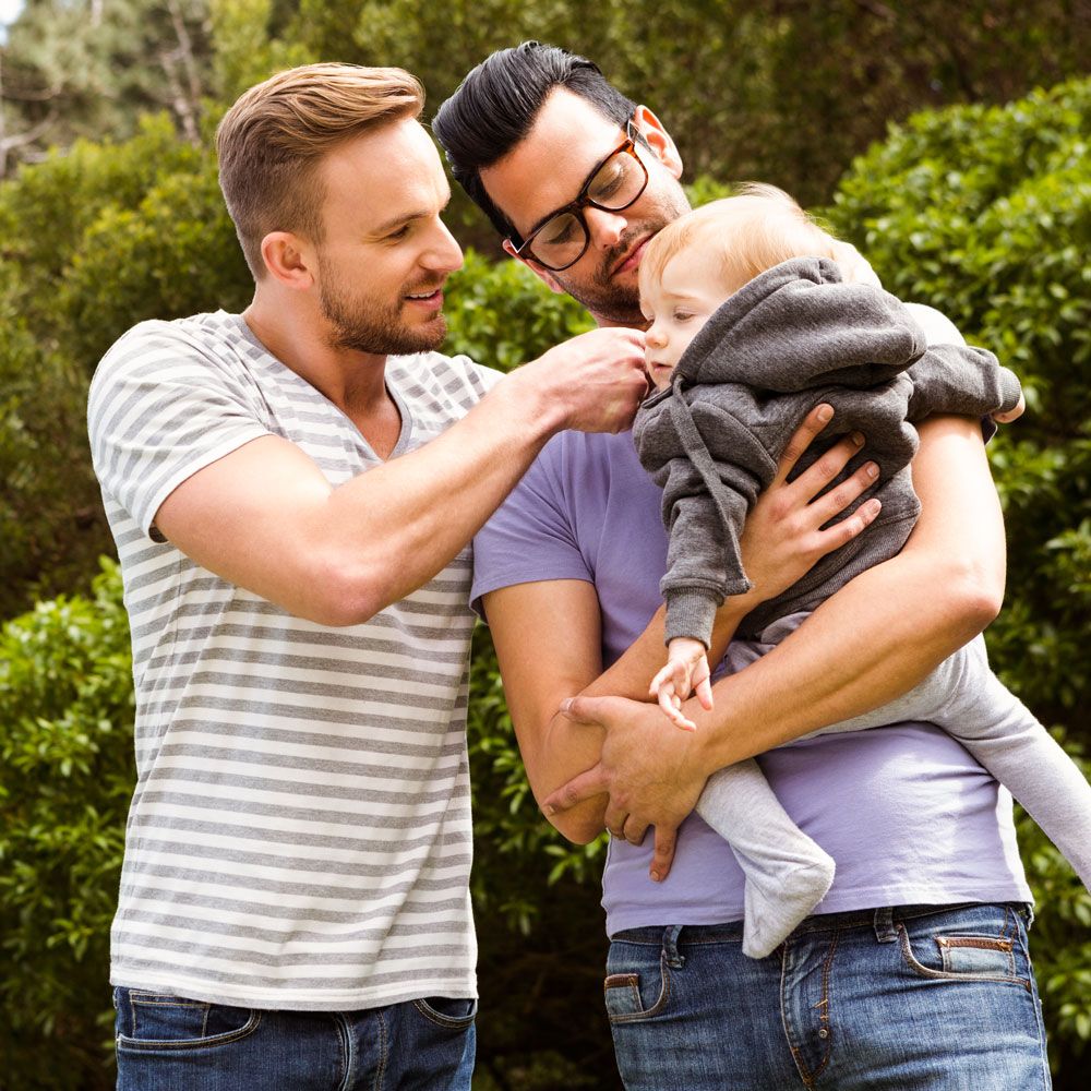 Gay men with their son